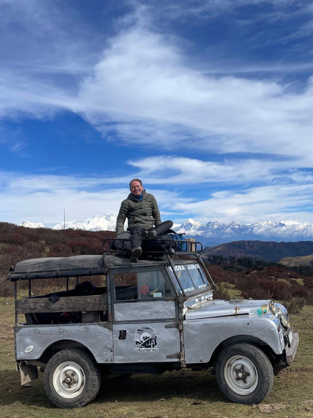 Erik Jager on a old English Jeep.